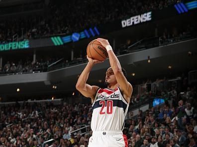 MILWAUKEE, WI - NOVEMBER 24: Landry Shamet #20 of the Washington Wizards shoots a three point basket against the Milwaukee Bucks during the In-Season Tournament on November 24, 2023 at the Fiserv Forum Center in Milwaukee, Wisconsin. NOTE TO USER: User expressly acknowledges and agrees that, by downloading and or using this Photograph, user is consenting to the terms and conditions of the Getty Images License Agreement. Mandatory Copyright Notice: Copyright 2023 NBAE (Photo by Gary Dineen/NBAE via Getty Images).