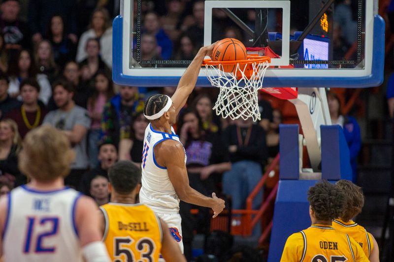 Feb 11, 2023; Boise, Idaho, USA; Boise State Broncos guard Chibuzo Agbo (11) dunks during the first half against the Wyoming Cowboys at ExtraMile Arena. Mandatory Credit: Brian Losness-USA TODAY Sports

