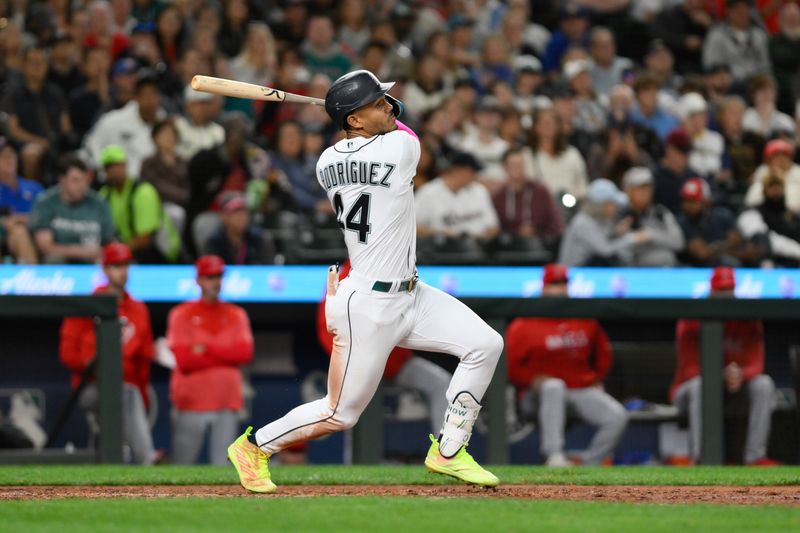 Sep 11, 2023; Seattle, Washington, USA; Seattle Mariners center fielder Julio Rodriguez (44) hits a double against the Los Angeles Angels during the sixth inning at T-Mobile Park. Mandatory Credit: Steven Bisig-USA TODAY Sports