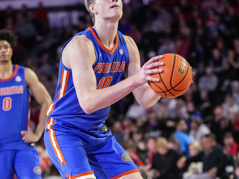 Feb 17, 2024; Athens, Georgia, USA; Florida Gators forward Thomas Haugh (10) shoots a free throw against the Georgia Bulldogs during the second half at Stegeman Coliseum. Mandatory Credit: Dale Zanine-USA TODAY Sports