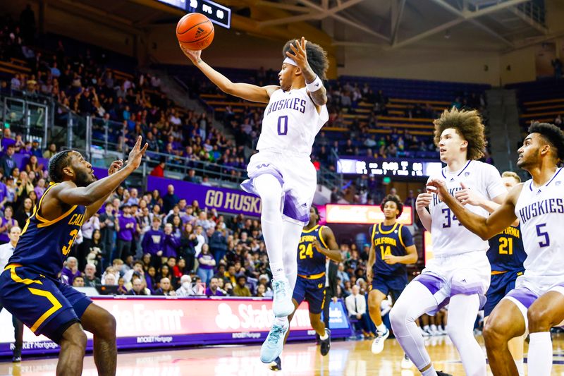 Jan 14, 2023; Seattle, Washington, USA; Washington Huskies guard Koren Johnson (0) passes away from California Golden Bears guard DeJuan Clayton (33) during the second half at Alaska Airlines Arena at Hec Edmundson Pavilion. Washington Huskies center Braxton Meah (34) and guard Jamal Bey (5) follow behind Johnson at right. Mandatory Credit: Joe Nicholson-USA TODAY Sports