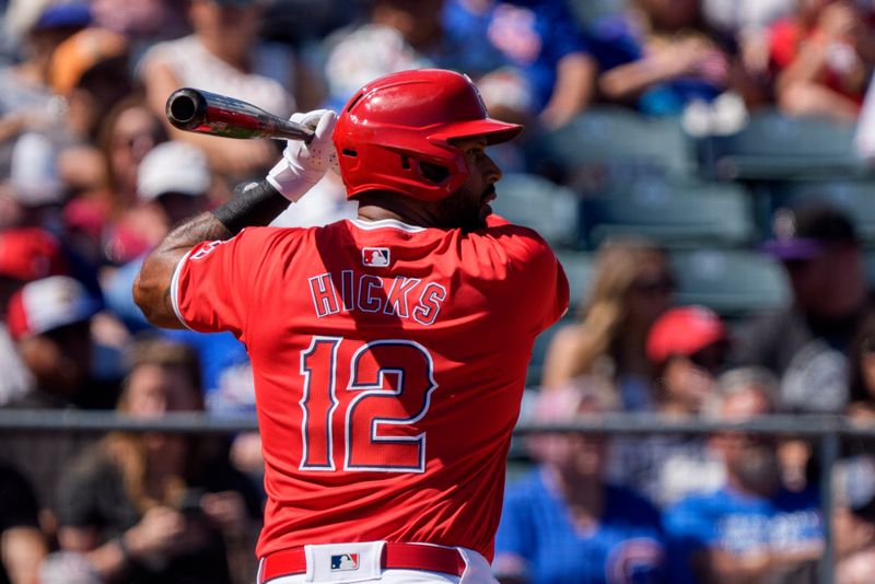 Mar 16, 2024; Tempe, Arizona, USA; Los Angeles Angels outfielder Aaron Hicks (12) at bat in the first during a spring training game against the Chicago Cubs at Tempe Diablo Stadium. Mandatory Credit: Allan Henry-USA TODAY Sports