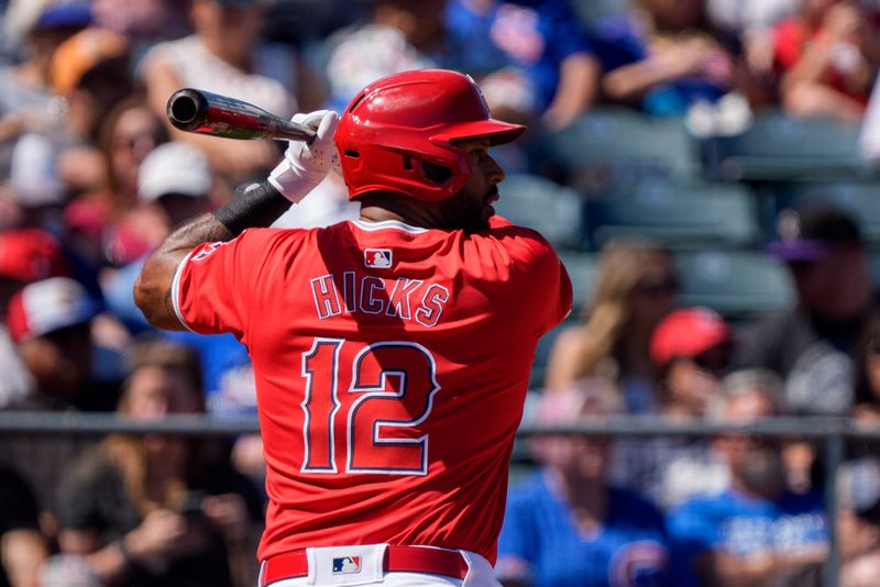 Mar 16, 2024; Tempe, Arizona, USA; Los Angeles Angels outfielder Aaron Hicks (12) at bat in the first during a spring training game against the Chicago Cubs at Tempe Diablo Stadium. Mandatory Credit: Allan Henry-USA TODAY Sports