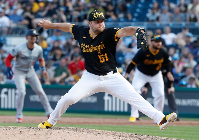 Jun 8, 2024; Pittsburgh, Pennsylvania, USA;  Pittsburgh Pirates pitcher David Bednar (51) pitches against the Minnesota Twins during the ninth inning at PNC Park. Pittsburgh won 4-0. Mandatory Credit: Charles LeClaire-USA TODAY Sports