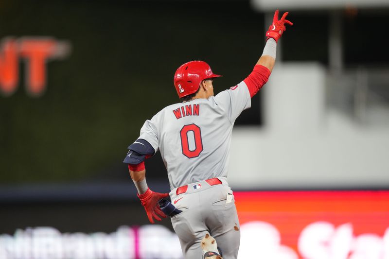 Jun 17, 2024; Miami, Florida, USA;  St. Louis Cardinals shortstop Masyn Winn (0) rounds the bases after hitting a two-run home run in the 12th inning against the Miami Marlins at loanDepot Park. Mandatory Credit: Jim Rassol-USA TODAY Sports