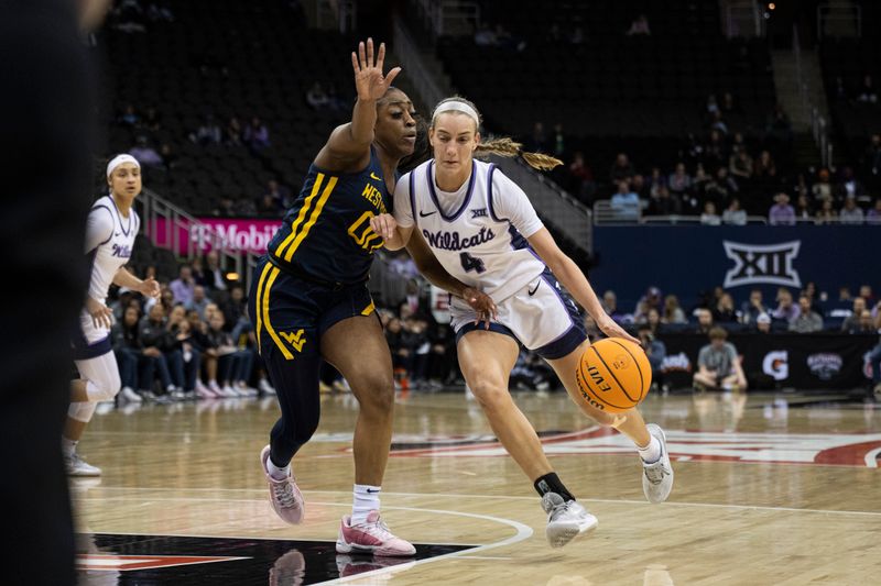 Mar 9, 2024; Kansas City, MO, USA; Kansas State Wildcats guard Serena Sundell (4) handles the ball while defended by West Virginia Mountaineers guard Jayla Hemingway (00) during the second half at T-Mobile Center. Mandatory Credit: Amy Kontras-USA TODAY Sports