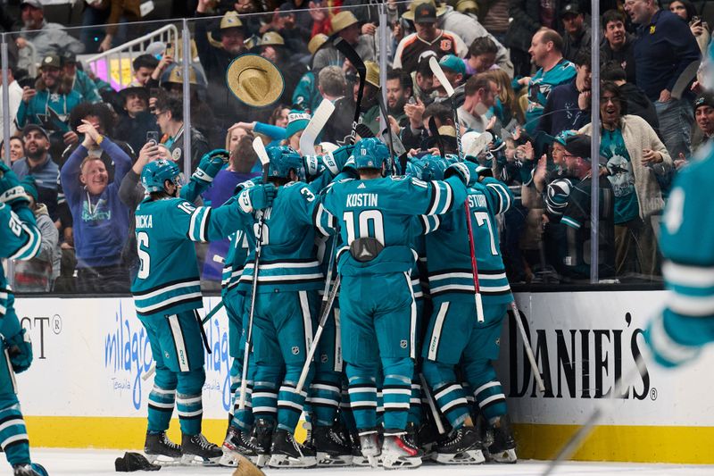 Apr 6, 2024; San Jose, California, USA; The San Jose Sharks celebrate after scoring the game-winning goal against the St. Louis Blues during the overtime period at SAP Center at San Jose. Mandatory Credit: Robert Edwards-USA TODAY Sports