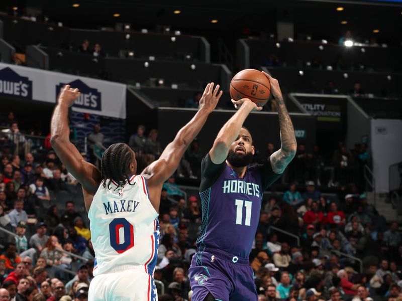 CHARLOTTE, NC - DECEMBER 3: Cody Martin #11 of the Charlotte Hornets shoots the ball during the game against the Philadelphia 76ers during an NBA Emirates Cup game on December 3, 2024 at Spectrum Center in Charlotte, North Carolina. NOTE TO USER: User expressly acknowledges and agrees that, by downloading and or using this photograph, User is consenting to the terms and conditions of the Getty Images License Agreement. Mandatory Copyright Notice: Copyright 2024 NBAE (Photo by Kent Smith/NBAE via Getty Images) 