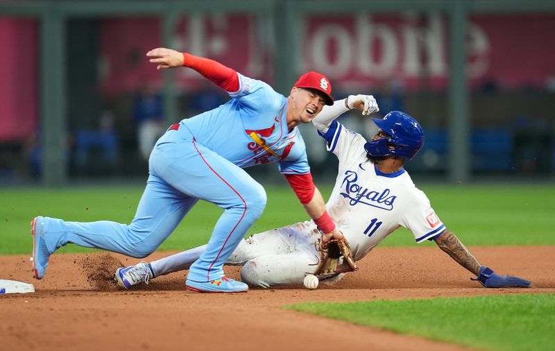 Aug 10, 2024; Kansas City, Missouri, USA; Kansas City Royals second baseman Maikel Garcia (11) steals second base against St. Louis Cardinals second baseman Nolan Gorman (16) during the seventh inning at Kauffman Stadium. Mandatory Credit: Jay Biggerstaff-USA TODAY Sports