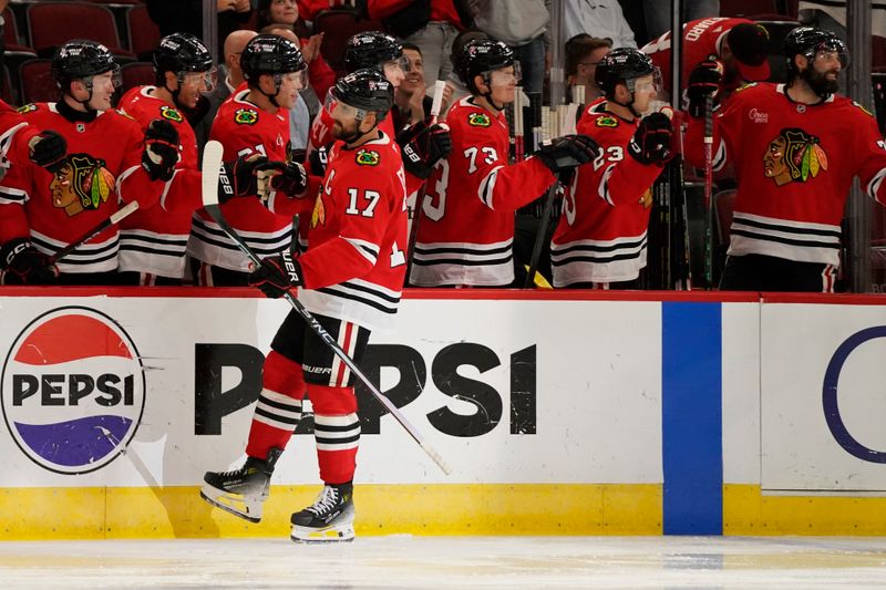 Oct 17, 2024; Chicago, Illinois, USA; Chicago Blackhawks left wing Nick Foligno (17) celebrates his goal against the San Jose Sharks during the second period at United Center. Mandatory Credit: David Banks-Imagn Images