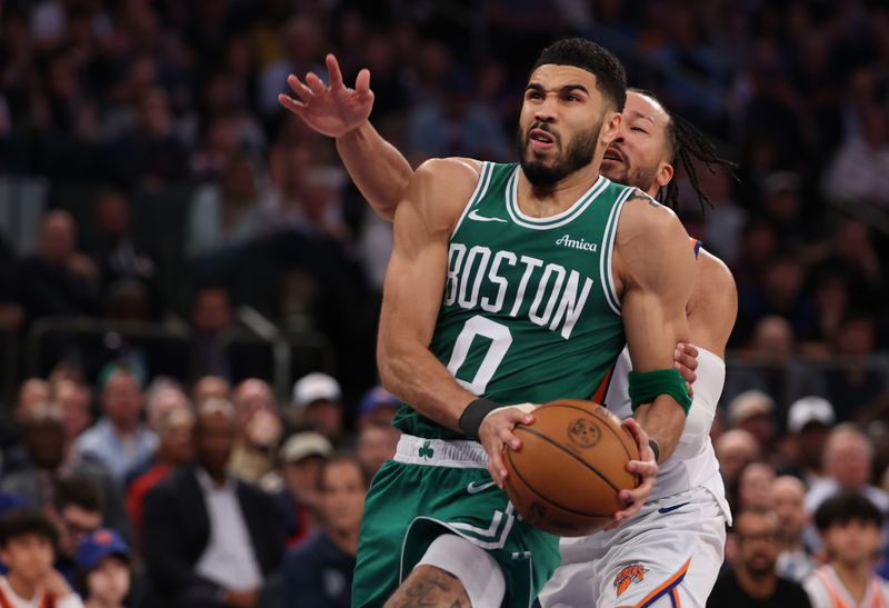NEW YORK, NEW YORK - MAY 10:  Jayson Tatum #0 of the Boston Celtics shoots against Jalen Brunson #11 of the New York Knicks  during game Three of the Eastern Conference Second Round NBA Playoffs at Madison Square Garden on May 10, 2025 in New York City.   User expressly acknowledges and agrees that, by downloading and or using this photograph, User is consenting to the terms and conditions of the Getty Images License Agreement.   (Photo by Al Bello/Getty Images)