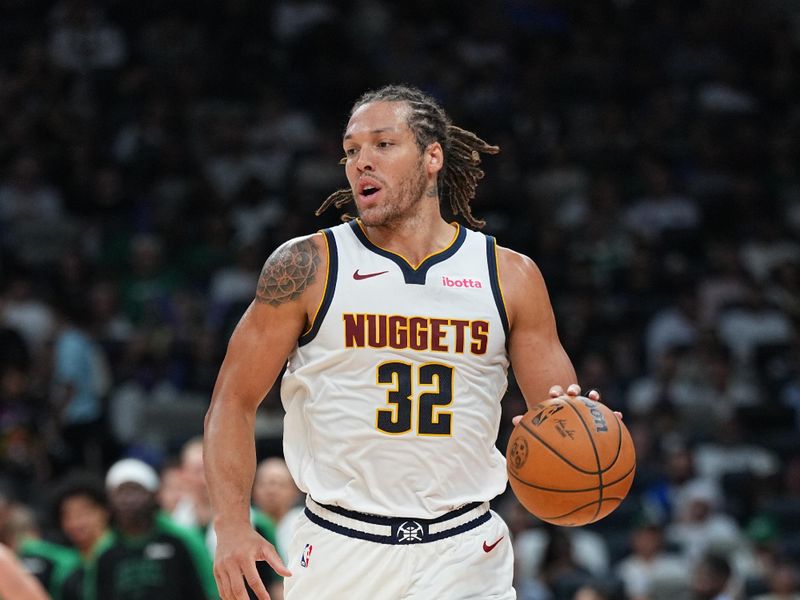 ABU DHABI, UAE - OCTOBER 4: Aaron Gordon #32 of the Denver Nuggets dribbles the ball during the game against the Boston Celtics during the 2024 Global Games on October 4, 2024 at the Etihad Arena in Abu Dhabi, United Arab Emirates. NOTE TO USER: User expressly acknowledges and agrees that, by downloading and/or using this Photograph, user is consenting to the terms and conditions of the Getty Images License Agreement. Mandatory Copyright Notice: Copyright 2024 NBAE (Photo by Garrett Ellwood/NBAE via Getty Images)