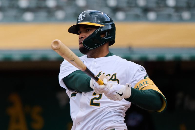 May 4, 2024; Oakland, California, USA; Oakland Athletics infielder Darell Hernaiz (2) bats against the Miami Marlins during the third inning at Oakland-Alameda County Coliseum. Mandatory Credit: Robert Edwards-USA TODAY Sports