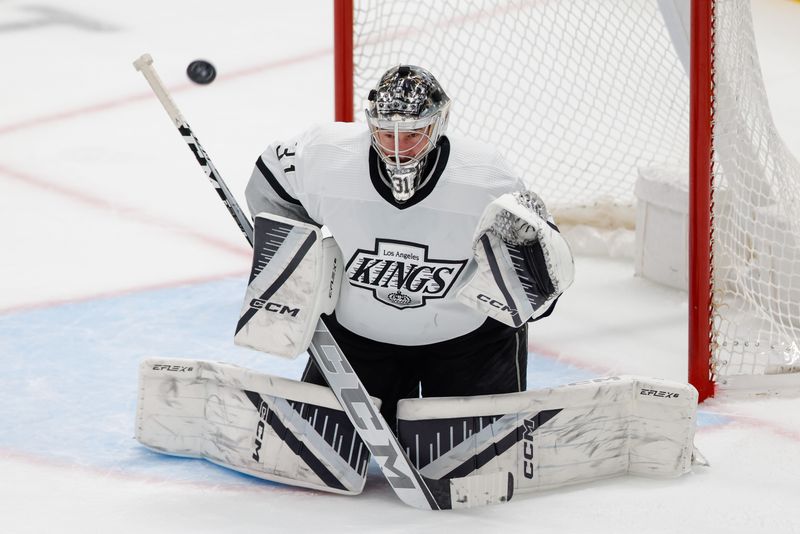 Mar 16, 2024; Dallas, Texas, USA; A puck is shot wide against Los Angeles Kings goaltender David Rittich (31) during the second period against the Dallas Stars at American Airlines Center. Mandatory Credit: Andrew Dieb-USA TODAY Sports