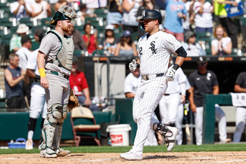 Sep 15, 2024; Chicago, Illinois, USA; Chicago White Sox outfielder Gavin Sheets (32) crosses home plate after hitting a two-run home run against the Oakland Athletics during the first inning at Guaranteed Rate Field. Mandatory Credit: Kamil Krzaczynski-Imagn Images