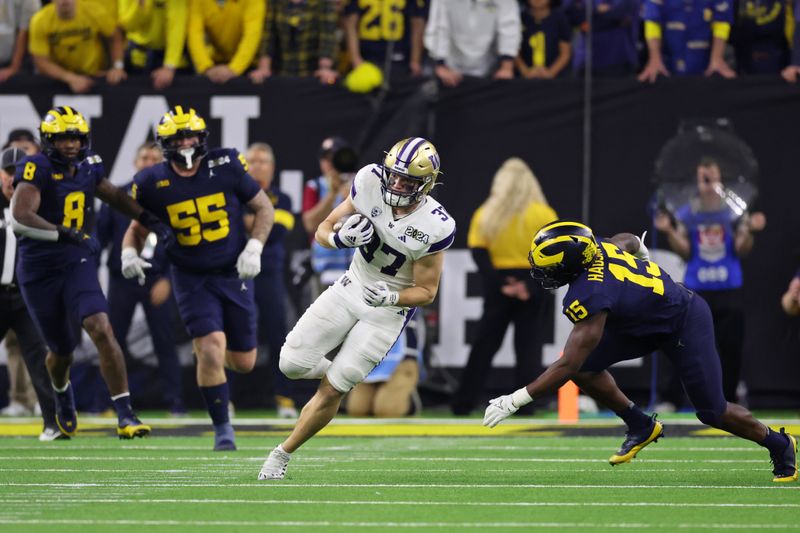 Jan 8, 2024; Houston, TX, USA; Washington Huskies tight end Jack Westover (37) runs with the ball against the Michigan Wolverines during the third quarter in the 2024 College Football Playoff national championship game at NRG Stadium. Mandatory Credit: Thomas Shea-USA TODAY Sports
