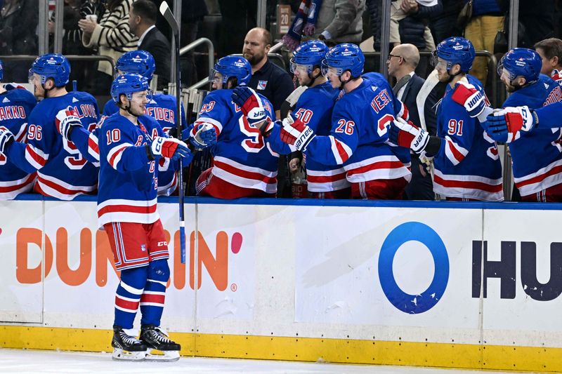 Apr 13, 2024; New York, New York, USA;  New York Rangers left wing Artemi Panarin (10) celebrates his goal against the New York Islanders during the third period at Madison Square Garden. Mandatory Credit: Dennis Schneidler-USA TODAY Sports