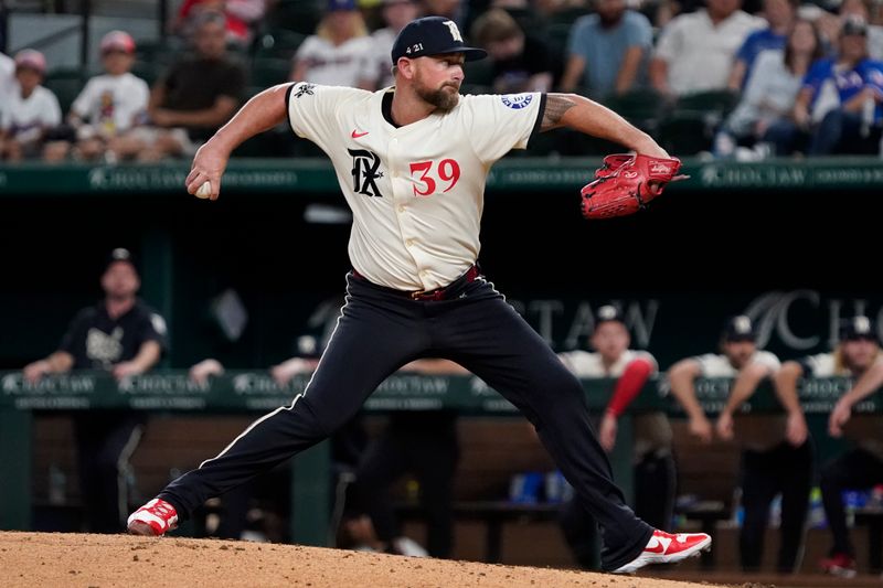 Jul 5, 2024; Arlington, Texas, USA; Texas Rangers pitcher Kirby Yates (39) throws to the plate during the ninth inning against the Tampa Bay Rays at Globe Life Field. Mandatory Credit: Raymond Carlin III-USA TODAY Sports