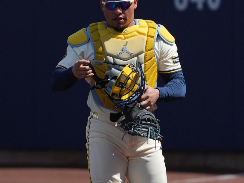 Mar 16, 2025; Phoenix, Arizona, USA; Milwaukee Brewers catcher William Contreras (24) gets ready for a game against the Cleveland Guardians at American Family Fields of Phoenix. Mandatory Credit: Rick Scuteri-Imagn Images