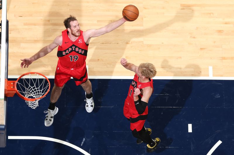 WASHINGTON, DC -? OCTOBER 11: Jakob Poeltl #19 of the Toronto Raptors rebounds the ball during the game against the Washington Wizards during a NBA preseason game on October 11, 2024 at Capital One Arena in Washington, DC. NOTE TO USER: User expressly acknowledges and agrees that, by downloading and or using this Photograph, user is consenting to the terms and conditions of the Getty Images License Agreement. Mandatory Copyright Notice: Copyright 2024 NBAE (Photo by Stephen Gosling/NBAE via Getty Images)