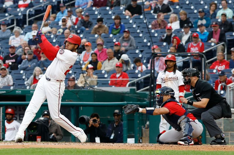 Sep 17, 2025; Washington, District of Columbia, USA; Washington Nationals outfielder James Wood (29) hits an RBI double against the Atlanta Braves during the fifth inning at Nationals Park. Mandatory Credit: Geoff Burke-Imagn Images