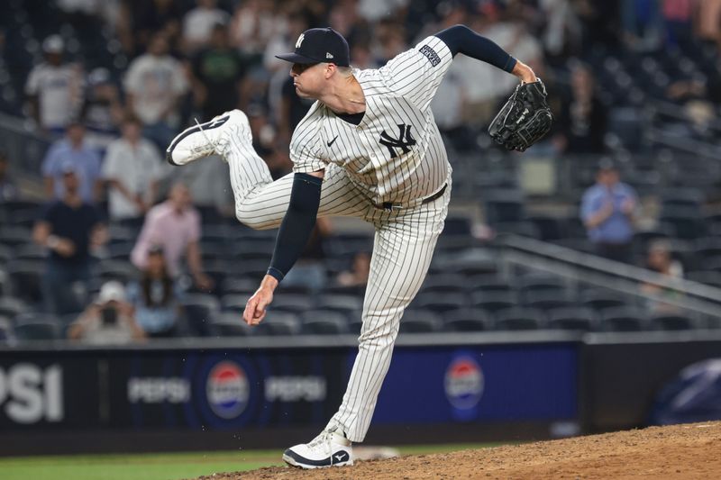 Jun 6, 2024; Bronx, New York, USA; New York Yankees relief pitcher Clay Holmes (35) delivers a pitch during the ninth inning against the Minnesota Twins at Yankee Stadium. Mandatory Credit: Vincent Carchietta-USA TODAY Sports