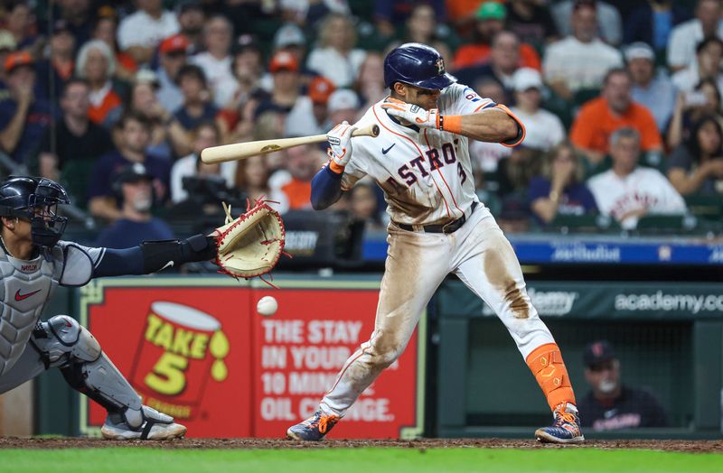 May 2, 2024; Houston, Texas, USA; Houston Astros shortstop Jeremy Pena (3) reacts after being hit by a pitch with the bases loaded during the seventh inning against the Cleveland Guardians at Minute Maid Park. Mandatory Credit: Troy Taormina-USA TODAY Sports