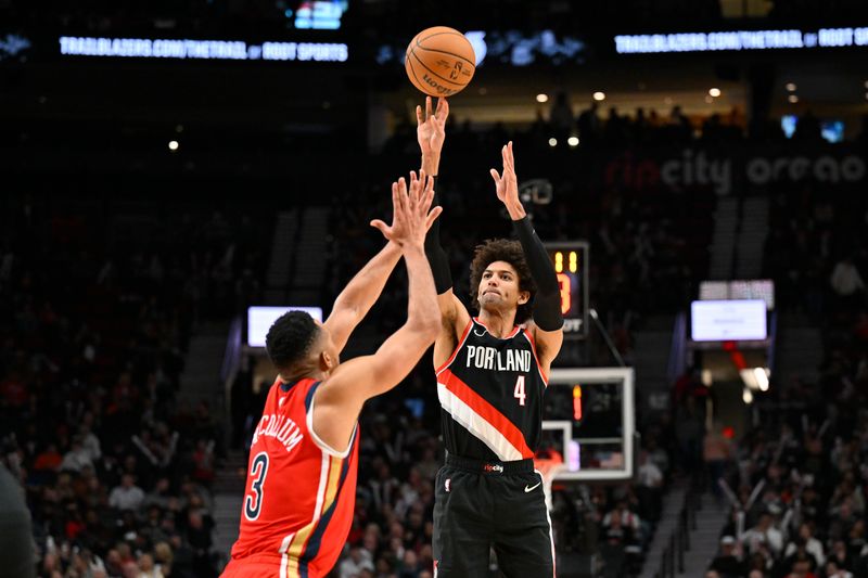 PORTLAND, OREGON - FEBRUARY 10: Matisse Thybulle #4 of the Portland Trail Blazers shoots against CJ McCollum #3 of the New Orleans Pelicans during the third quarter of the game at the Moda Center on February 10, 2024 in Portland, Oregon. The New Orleans Pelicans won 93-84. NOTE TO USER: User expressly acknowledges and agrees that, by downloading and or using this photograph, User is consenting to the terms and conditions of the Getty Images License Agreement. (Photo by Alika Jenner/Getty Images)