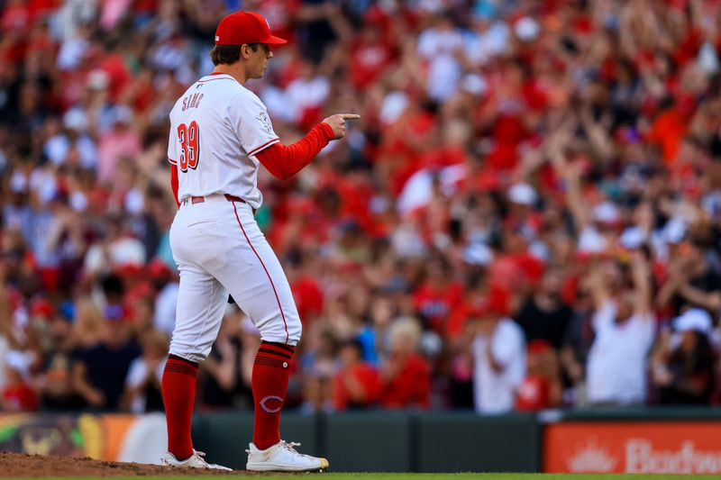 May 27, 2024; Cincinnati, Ohio, USA; Cincinnati Reds relief pitcher Lucas Sims (39) reacts after the victory over the St. Louis Cardinals at Great American Ball Park. Mandatory Credit: Katie Stratman-USA TODAY Sports