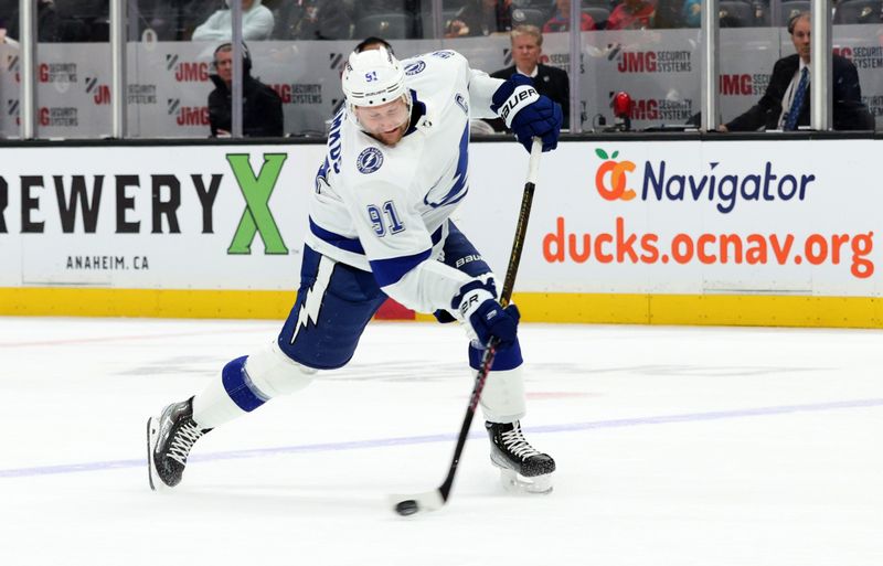 Mar 24, 2024; Anaheim, California, USA; Tampa Bay Lightning center Steven Stamkos (91) shoots during the first period against the Anaheim Ducks at Honda Center. Mandatory Credit: Jason Parkhurst-USA TODAY Sports