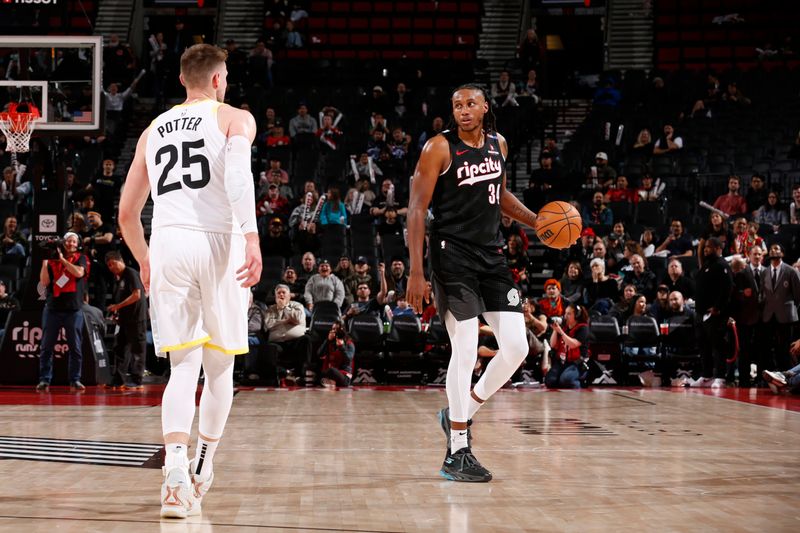 PORTLAND, OR - DECEMBER 6: Jabari Walker #34 of the Portland Trail Blazers dribbles the ball during the game against the Utah Jazz on December 6, 2024 at the Moda Center Arena in Portland, Oregon. NOTE TO USER: User expressly acknowledges and agrees that, by downloading and or using this photograph, user is consenting to the terms and conditions of the Getty Images License Agreement. Mandatory Copyright Notice: Copyright 2024 NBAE (Photo by Cameron Browne/NBAE via Getty Images)