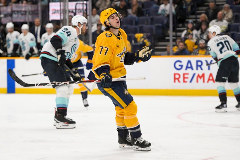 Mar 6, 2025; Nashville, Tennessee, USA;  Nashville Predators right wing Luke Evangelista (77) reacts a after a missed shot on goal against the Seattle Kraken during the third period at Bridgestone Arena. Mandatory Credit: Steve Roberts-Imagn Images