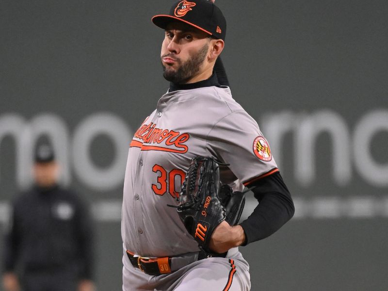 Apr 11, 20024; Boston, Massachusetts, USA; Baltimore Orioles starting pitcher Grayson Rodriguez (30) pitches against the Boston Red Sox during the first inning at Fenway Park. Mandatory Credit: Eric Canha-USA TODAY Sports