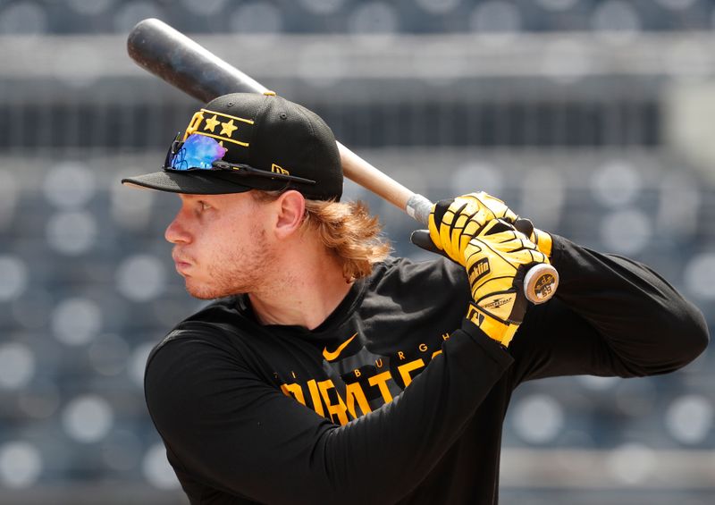 Jul 3, 2024; Pittsburgh, Pennsylvania, USA;  Pittsburgh Pirates center fielder Jack Suwinski (65) at the batting cage before a game against the St. Louis Cardinals at PNC Park. Mandatory Credit: Charles LeClaire-USA TODAY Sports