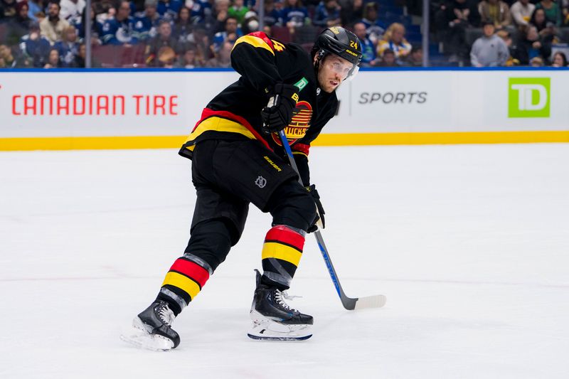 Dec 23, 2023; Vancouver, British Columbia, CAN; Vancouver Canucks forward Pius Suter (24) skates against the San Jose Sharks in the first period at Rogers Arena. Mandatory Credit: Bob Frid-USA TODAY Sports