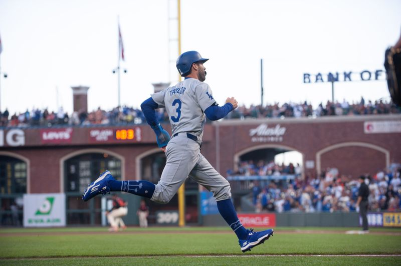 Jun 29, 2024; San Francisco, California, USA; Los Angeles Dodgers outfielder Chris Taylor (3) on his way to score against the San Francisco Giants during the eleventh inning at Oracle Park. Mandatory Credit: Ed Szczepanski-USA TODAY Sports