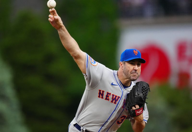 May 27, 2023; Denver, Colorado, USA; New York Mets starting pitcher Justin Verlander (35) delivers against the Colorado Rockies in the first inning at Coors Field. Mandatory Credit: Ron Chenoy-USA TODAY Sports