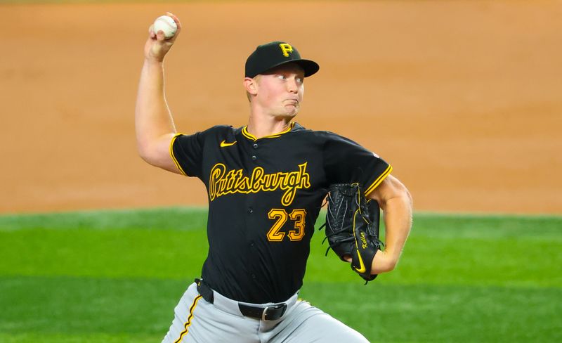 Aug 20, 2024; Arlington, Texas, USA; Pittsburgh Pirates starting pitcher Mitch Keller (23) throws during the first inning against the Texas Rangers  at Globe Life Field. Mandatory Credit: Kevin Jairaj-USA TODAY Sports