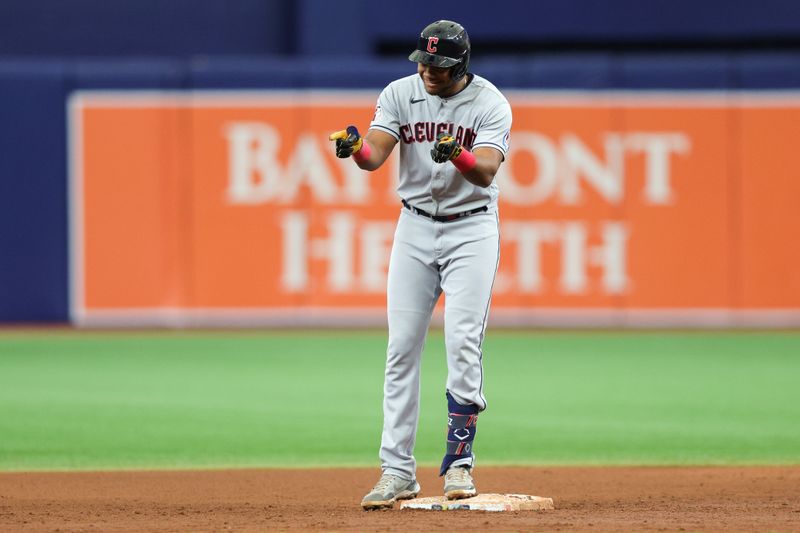 Aug 13, 2023; St. Petersburg, Florida, USA;  Cleveland Guardians designated hitter Oscar Gonzalez (39) reacts after hitting a double against the Tampa Bay Rays in the sixth inning at Tropicana Field. Mandatory Credit: Nathan Ray Seebeck-USA TODAY Sports