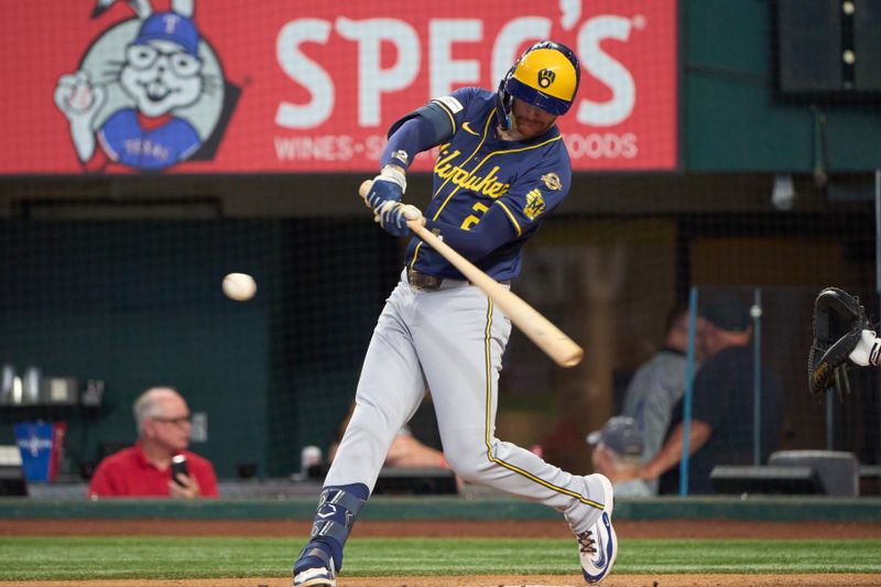 Sep 10, 2025; Arlington, Texas, USA; Milwaukee Brewers second baseman Brice Turang (2) hits a solo home run against the Texas Rangers  during the first inning at Globe Life Field. Mandatory Credit: Jim Cowsert-Imagn Images