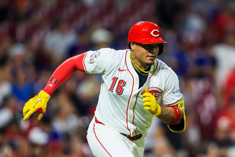 Jul 29, 2024; Cincinnati, Ohio, USA; Cincinnati Reds third baseman Noelvi Marte (16) runs to second after hitting a double against the Chicago Cubs in the eighth inning at Great American Ball Park. Mandatory Credit: Katie Stratman-USA TODAY Sports