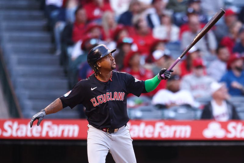 May 24, 2024; Anaheim, California, USA; Cleveland Guardians third base José Ramírez (11) watches his home run against the Los Angeles Angels during the third inning of a game at Angel Stadium. Mandatory Credit: Jessica Alcheh-USA TODAY Sports