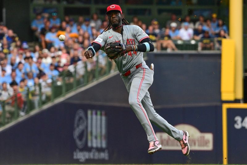 Aug 10, 2024; Milwaukee, Wisconsin, USA;  Cincinnati Reds shortstop Elly De La Cruz (44) throws out Milwaukee Brewers third baseman Joseph Ortiz (3) in the third inning at American Family Field. Mandatory Credit: Benny Sieu-USA TODAY Sports