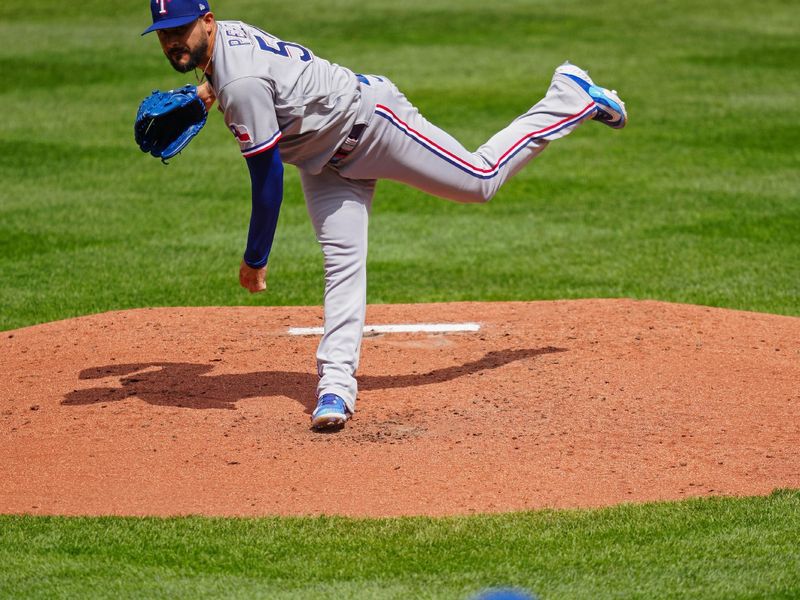 Apr 19, 2023; Kansas City, Missouri, USA; Texas Rangers starting pitcher Martin Perez (54) pitches to Kansas City Royals center fielder Jackie Bradley Jr. (41) during the third inning at Kauffman Stadium. Mandatory Credit: Jay Biggerstaff-USA TODAY Sports