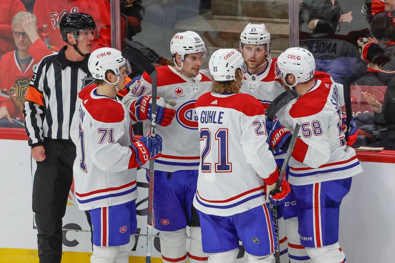 Dec 22, 2023; Chicago, Illinois, USA; Montreal Canadiens right wing Josh Anderson (17) celebrates with teammates after a goal against the Chicago Blackhawks during the second period at United Center. Mandatory Credit: Kamil Krzaczynski-USA TODAY Sports