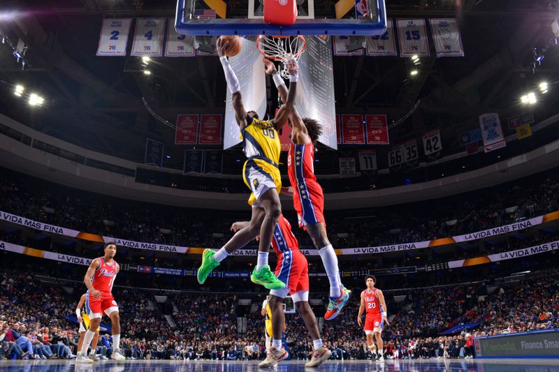 PHILADELPHIA, PA - DECEMBER 13: Bennedict Mathurin #00 of the Indiana Pacers drives to the basket during the game against the Philadelphia 76ers on December 13, 2024 at the Wells Fargo Center in Philadelphia, Pennsylvania NOTE TO USER: User expressly acknowledges and agrees that, by downloading and/or using this Photograph, user is consenting to the terms and conditions of the Getty Images License Agreement. Mandatory Copyright Notice: Copyright 2024 NBAE (Photo by Jesse D. Garrabrant/NBAE via Getty Images)