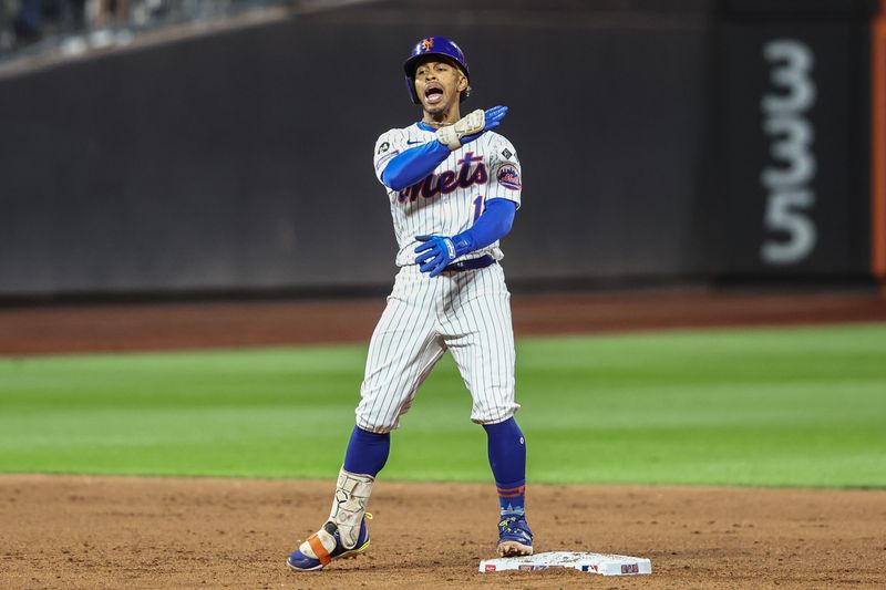 Sep 3, 2024; New York City, New York, USA;  New York Mets shortstop Francisco Lindor (12) celebrates after hitting an RBI double in the eighth inning against the Boston Red Sox at Citi Field. Mandatory Credit: Wendell Cruz-Imagn Images