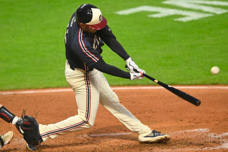 May 17, 2024; Cleveland, Ohio, USA; Cleveland Guardians designated hitter David Fry (6) hits a two-run home run in the sixth inning against the Minnesota Twins at Progressive Field. Mandatory Credit: David Richard-USA TODAY Sports