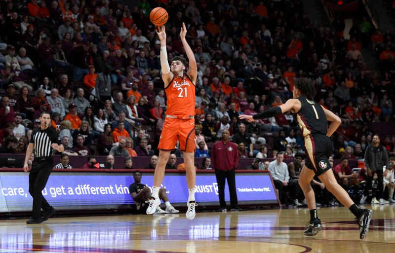 Mar 4, 2023; Blacksburg, Virginia, USA; Virginia Tech Hokies forward Grant Basile (21) shoots the ball against the Florida State Seminoles in the second half at Cassell Coliseum. Mandatory Credit: Lee Luther Jr.-USA TODAY Sports