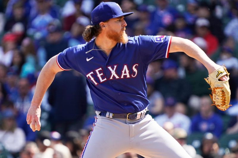 Apr 9, 2023; Chicago, Illinois, USA; Texas Rangers starting pitcher Jon Gray (22) throws the ball against the Chicago Cubs during the first inning at Wrigley Field. Mandatory Credit: David Banks-USA TODAY Sports